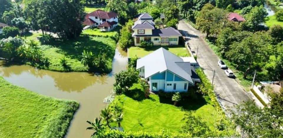 New built single storey Lake side house for sale with greenery view, located in community gate in Doi Saket area