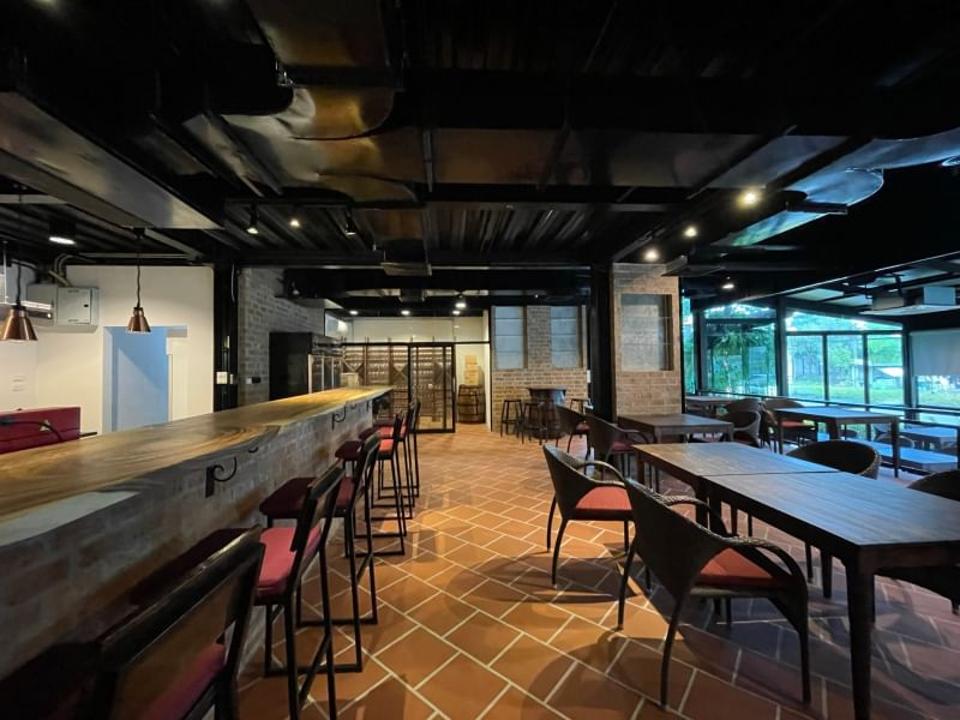 The Brand New Modern Loft Industrial Style Upscale and Humble Restaurant with some green outdoor landscaping Parking Ready for Business in San Phi Suea 15 minutes to City Center